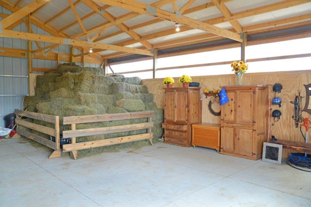 Concrete floors with hay storage.