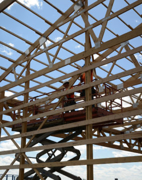 Trusses being installed for a post-frame building